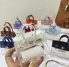 Celebridad de Internet Estuche para Llaves de Coche Nuevo Bolsa Mini de Platino Adornos Colgantes Bolsa para Auriculares Exquisita de Gama Alta Sobre Rojo Adornos Colgantes para Coche