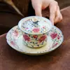 Taza de té de cerámica hecha en fábrica con diseños de loto y peonía, juego de té kung fu para uso doméstico, cuenco de té con tapa que no quema las manos