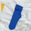 Meias de gelo meias de tubo médio feminino primavera e verão veludo japonês JK meias finas pilha meias de gelo de verão feminino