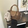 Moda Transfronteriza 2025 Versátil Nuevo Bolso Pequeño tipo Cubo de Hombro Cruzado Empalme de Bloques de Color Bolso Cruzado de Hombro Tipo Cubo