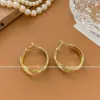 Pendientes de botón geométricos de metal retro S925 de Europa y Estados Unidos para mujer, pendientes de oreja de estilo frío, alta gama, joyería para orejas, venta al por mayor