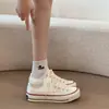 Zapatillas clásicas de lona vulcanizada para mujer, nuevas zapatillas versátiles para estudiantes primavera 2026, versión coreana ins zapatos casuales para mujer