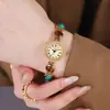Goldie de Segunda Mano Lujo Ligero Gama Alta Reloj Pulsera Colorido Nicho Gama Alta Cadena Ojo de Gato Reloj de Cuarzo