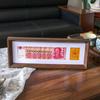 Seiscientos yuan billetes diez mil millones marco de fotos creativo aumento en conjunto de RMB marco de fotos color nogal lujo ligero para dar a la gente una fortuna