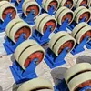Veículo de transferência de pás de ventilador de geração de energia eólica rodízios de fileira dupla. Com as rodinhas universais do carrinho de estrada. Rodízios de dupla fila para carrinho de armazenamento
