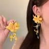 Brincos de borla com flores coloridas super etéreos, brincos stud e argolas doces de nicho de alta qualidade, brincos exagerados estilo férias