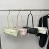 2026 Verão Novo Vintage Simples Nicho Design Único Tendência Moda Versátil Bolsa de Ombro Único Bolsa Transversal