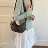 Bolsa transversal simples e doce estilo coreano para mulheres, novo modelo 2026, bolsa versátil de alta qualidade estilo bolinho, bolsa de ombro de moda nicho