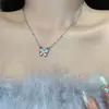 Nuevo collar de ópalo con mariposa 2023 diseño de nicho femenino cadena para la clavícula de lujo ligero Accesorios de moda Venta al por mayor