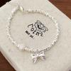 Dulce pulsera simple de perlas y lazo de plata rota irregular para mujer, diseño de nicho de moda de lujo ligero, nueva