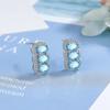 Outlet de Fábrica Aretes Nuevos Incrustados con Circonita Azul Londres Punto de Diamante Completo Cruz de Cristal Afilada Pendientes Europeos y Americanos Transfronterizos
