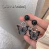 Pendientes de mariposa negra con diseño de nicho Dongju, pendientes frescos y dulces, pendientes de aguja de plata de estilo frío sin perforaciones para mujeres