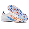 2026 Nuevos Zapatos de Fútbol Transfronterizos AG de Tacos Largos de Caña Baja para Hombres y Mujeres Jóvenes TF Zapatos de Fútbol para Entrenamiento con Tacos Venta al por Mayor