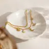 Pulsera Wanxing de Acero Inoxidable Oro 18K Europeo y Americano Ojo de Diablo Luna Circonita Blanca Accesorios de Joyería de Comercio Exterior Transfronterizo