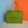 Sets de regalo promocionales corporativos hechos a medida 2027, regalos festivos del Año de la Oveja, bolsas de fieltro, bolsos de mano publicitarios personalizados