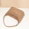 Bolso de paja nuevo de primavera y verano bolso hobo de alta gama para debajo del brazo bolso de playa de rafia para llevar a mano un solo hombro bolso tipo dumpling