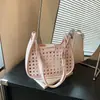 Moderna Bolso Cubo Grande Nuevo para Mujer 2026 Estilo Coreano Hueco Bolso de Hombro Único Versátil Bolso Cruzado para el Viaje Diario