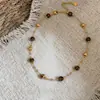 Pulseira redonda de pérolas com contas estilo francês, um colar luxuoso e elegante, um conjunto de joias minimalista e moderno, um acessório versátil e único para mulheres