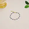 Pulseira Olho do Diabo Colorido 18K Europeia e Americana para Meninas, Olhos Azuis de Aço Titânio de Alto Padrão com Gotejamento de Óleo, Joia de Mão de Luxo Acessível