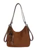 Mochila de Felpa de Gamuza Súper Caliente para Mujer 2026 Nueva de Gran Capacidad Bolso de Hombro Retro Mate Versátil para Viajar Bolso Cruzado
