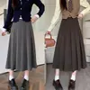 Colección de otoño 2026: nuevo midi plisado de línea A de cintura alta para tallas grandes, diseñado para hacer que las figuras petite parezcan más delgadas