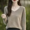 Venta al por mayor del fabricante Nuevo suéter de punto sin costuras de una sola pieza con cuello en V para mujer, jersey de manga larga, suéter de capa base para mujer