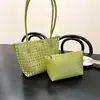 2026 Nova Bolsa Cesta Vazada Tecida Transfronteiriça de Férias Moda Coreana Ins Bolsa Balde Mãe-Filho Bolsa de Ombro