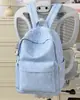 Mochila Estilo Universitario Azul Hielo Frío Bordado de Estrella de Ensueño para Estudiantes, Perfecta para Vacaciones y Salidas, Mochila Pequeña Linda