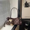 Bolsa Tote de Ombro Grande Capacidade Ponto de Bolinha Moda Outono 2026 Pequena Nicho Transfronteiriça para o Dia a Dia