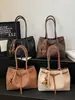 Bolso de hombro versátil de gran capacidad transfronterizo para mujer, nuevo bolso de compras casual de otoño 2026, bolso tote texturizado para el trabajo