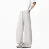 Pantalones finos de seda helada para hombre de verano 2025, pantalones casuales rectos holgados con caída, pantalones de vestir grises