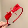 Faixa de Cabeça Coroa de Ano Novo Infantil Fofa com Bola de Pelo Laço Faixa de Cabeça Festiva Vermelha de Ano Novo para Meninas Faixa de Cabeça