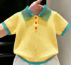Roupa Infantil Coreana 2026 Verão Nova Chegada Amarelo Tricô Texturizado Manga Curta Infantil Dopamina Gola Polo Camisa Shorts
