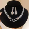 ¡Lujo europeo y americano! Collar de flor de circón de colores con gota de agua, cadena para clavícula de estilo court vintage, joyería de lujo ligero de alta gama
