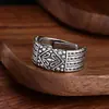 Anillo de alta gama plateado de moda con diseño de flor de iris de patrón trenzado, abierto ajustable joyería de moda vintage, directo del fabricante