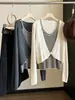 Elegante top de punto a rayas de dos piezas falsas retorcidas para mujer, nuevo estilo coreano de otoño, ajuste ceñido, manga larga, blusa única
