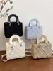 Bolsa Saco Plissada Rombos Retro Simples de Luxo High-End Transfronteiriça Feminina Nova Primavera 2026 Bolsa de Mão