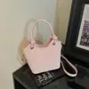 Bolso pequeño súper popular para el trabajo, nuevo bolso de hombro vintage con estampado de leopardo para mujer 2026, bolso cruzado tipo cubo