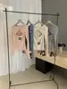 Wgwe8304 Guangzhou Treze Linhas Feminino Outono e Inverno Novo Design Nicho Desejo Puro Garota Popular Camiseta Manga Longa Top