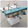 Taladro horizontal multi-cabezal ajustable de Guangdong, una taladradora de nivel de hardware, cuenta con taladrado automático y puede perforar agujeros de varios tamaños