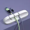 Organizador de cabos para mesa, organizador de cabo de carregamento de celular e cabo de dados, fixador de roteamento de cabos, agrupador de armazenamento, grampo de cabo