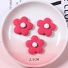 Fabricante en stock de resina esmerilada elegante flor redondeada de cinco pétalos DIY accesorios para el cabello para niños carcasa de teléfono móvil material de belleza