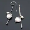 Pendientes Minimalistas de Hoja de Planta para Mujer Venta Caliente Transfronteriza Pendientes Colgantes de Metal con Forma de Pétalo Deseo