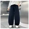 Nueva colección de otoño de ropa infantil: Pantalones deportivos para niños de pierna recta con estampado integral, pantalones largos de punto holgados para niños mayores, estilo moderno para primavera y otoño de 2026