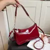 Moda Otoño 2026 Color Sólido Cuero Brillante Casual Simple Gran Capacidad Bolso de Hombro Cruzado Bolso de Mano Bolso de Axila