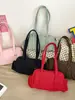 Bolsa Baguete Pequena Simples Leve Feminina 2026 Novo Estilo Tendência Nicho Leve Doce Cool Bolsa de Ombro Bolsa Simples de Axila