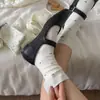Calcetines blancos de otoño e invierno con lazo, patrones de rayas y lunares, con ribete de encaje, lindos, adecuados para estudiantes y niñas jóvenes, de longitud media hasta la pantorrilla.