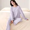 Pijama de algodón elástico de manga larga y pantalón largo de otoño, nuevo al por mayor para mujer, cuello redondo, se puede usar en el exterior, conjunto de dos piezas para el hogar