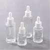 Em estoque atacado frasco de vidro transparente para óleo essencial frasco de loção de ombro plano sub-frasco cosmético frasco conta-gotas com cabeça de cola para essência