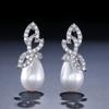 RAKOL Corea aretes de flor simples de moda nueva para mujer aretes de circonita perla temperamento Joker una generación de cabello